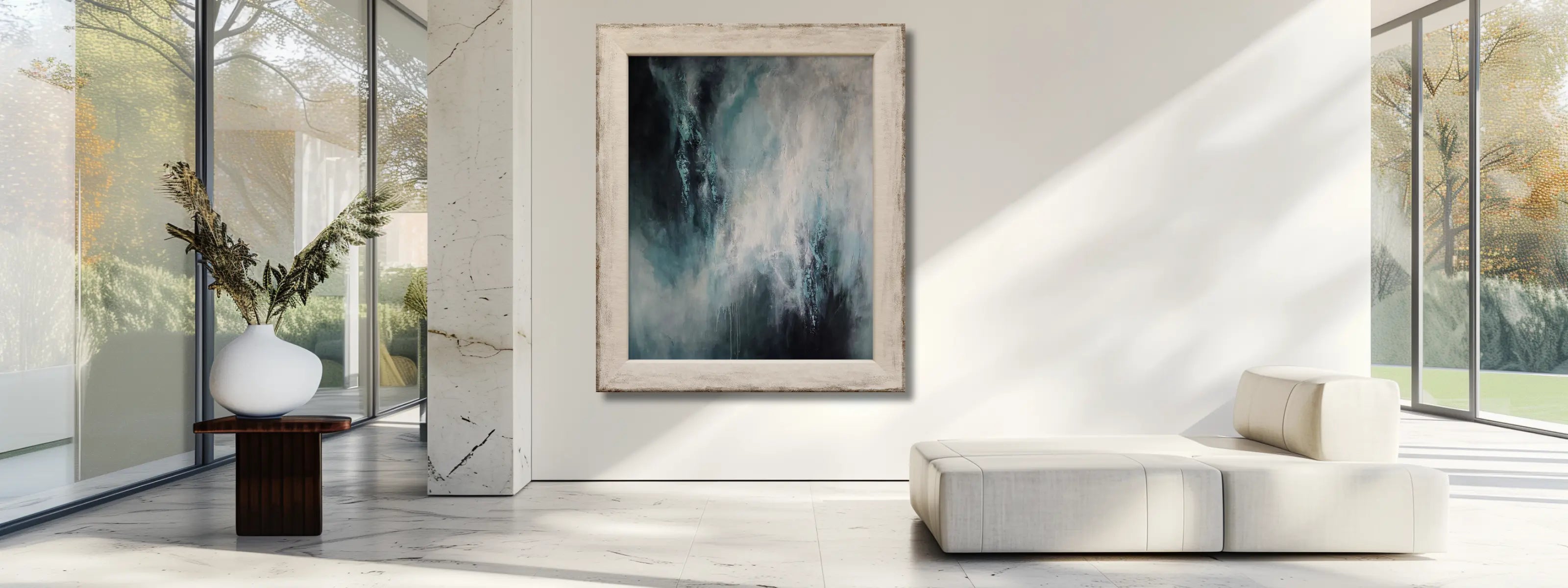 Modern bright living room with a white sofa and a large abstract wall art in a large wooden frame.