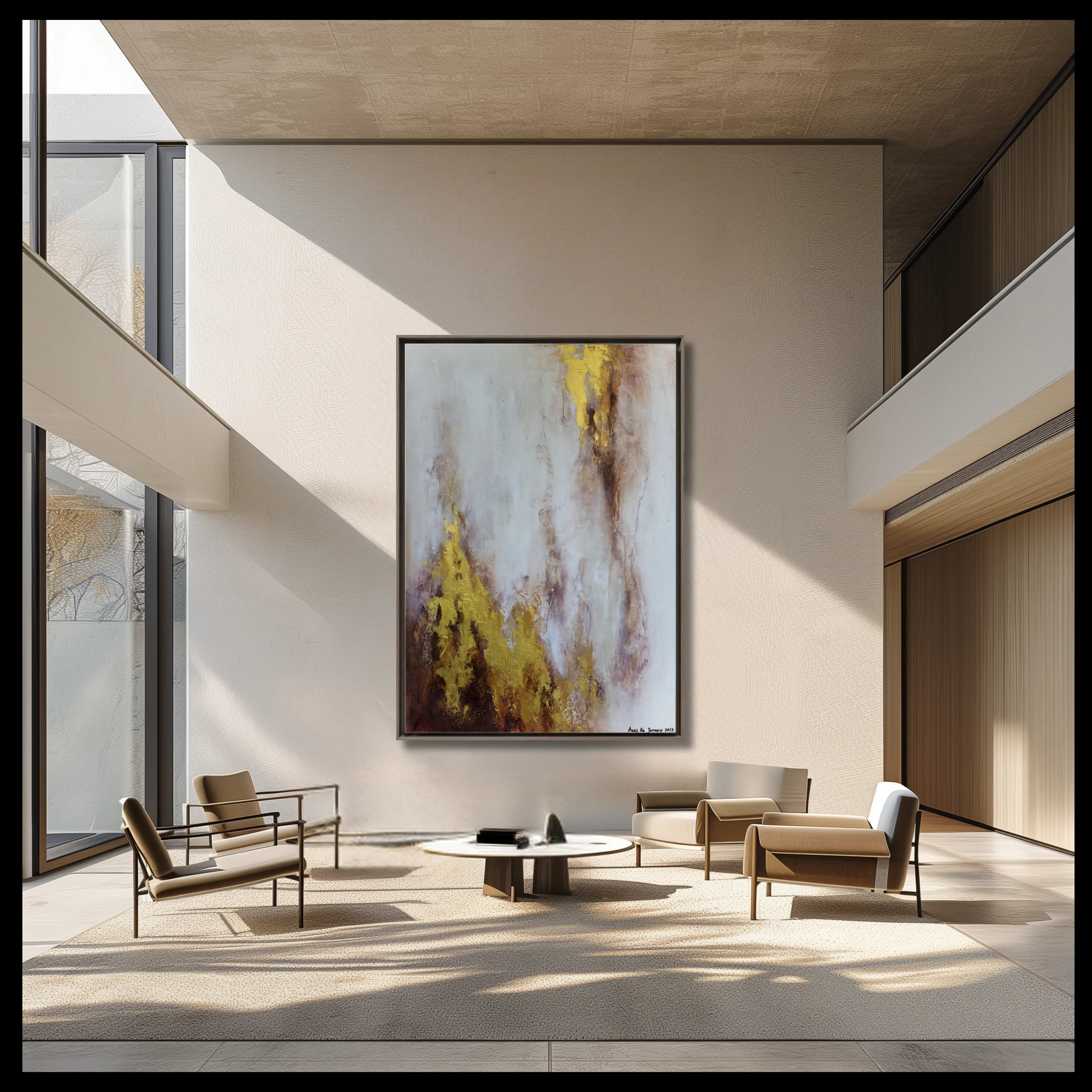 Large minimalist living room in beige and a large framed abstract painting in bronze, gold and white. 